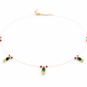 Invisible necklace with green crystal drops, red accent beads and gold chain on a white background
