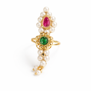 Pearl Nath finger ring with green and pink stones, gold-tone finish, displayed on a clean cream background