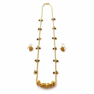 Golden Mangalsutra with matching earrings displayed on a white background.